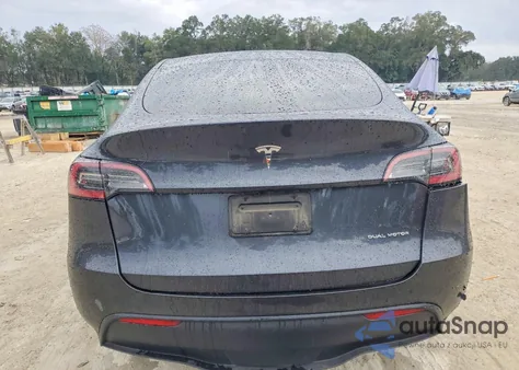 2025 Tesla Model Y from USA, damaged, VIN 7SAYGDEE5SA354806